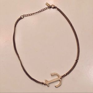 Gold and cream anchor necklace